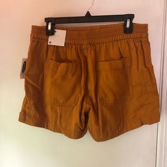 Brand new orange stretchy shorts - Picture 2 of 2